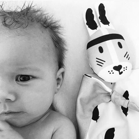 Newborn with River Kippin baby comforter