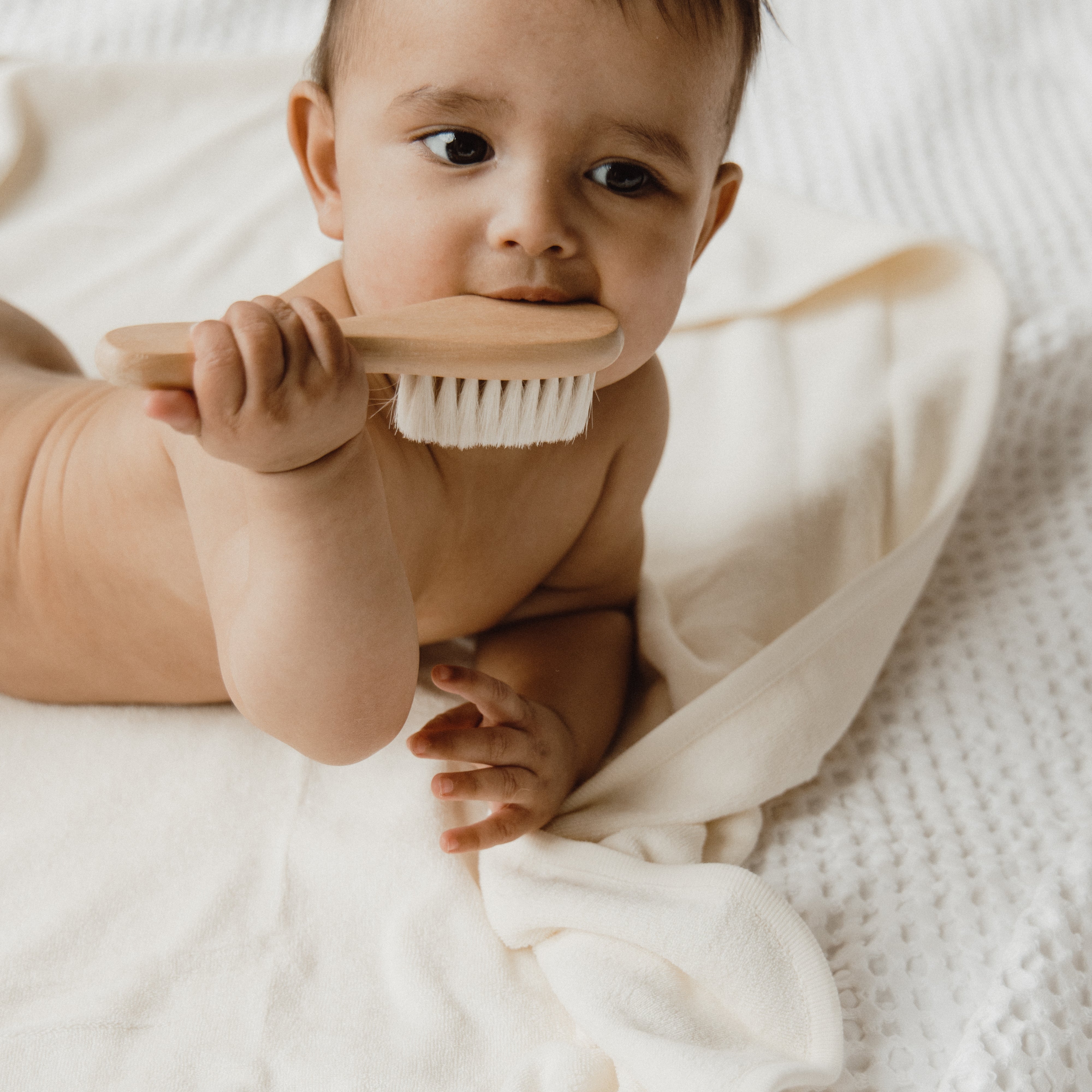 BEETL Baby Brush with soft bristles for gentle hair and scalp care, designed for infants and young children.