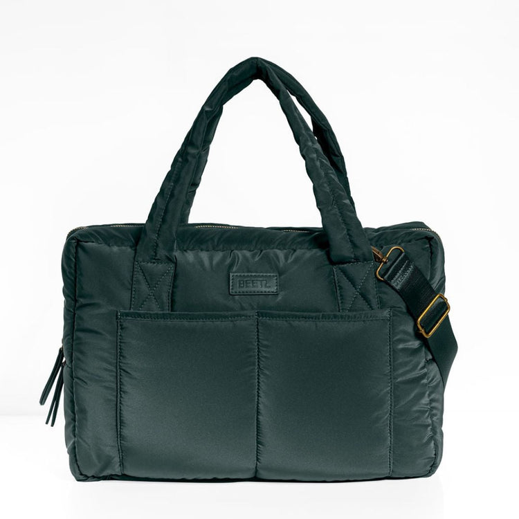 Forest green baby bag by BEETL featuring multiple compartments and adjustable straps, designed for convenient parent and baby essentials.
