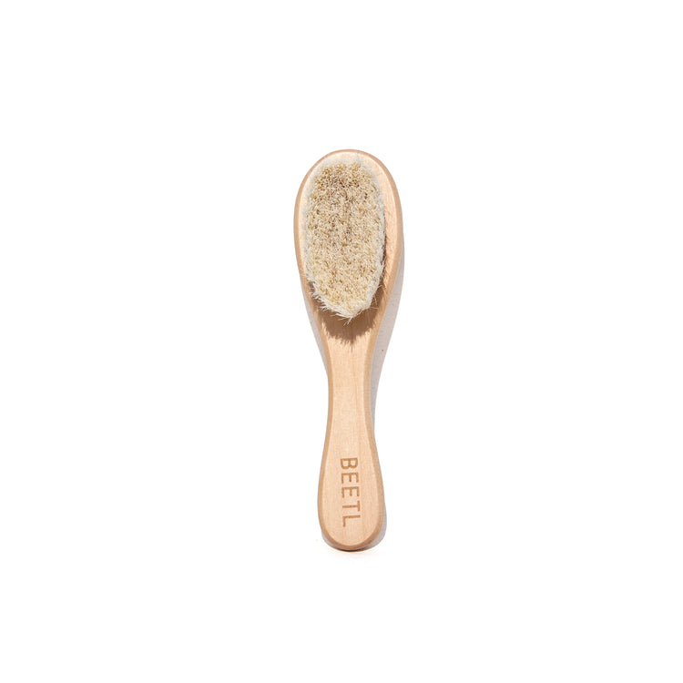 BEETL Baby Brush with soft bristles and ergonomic handle, gentle for delicate baby hair and scalp.