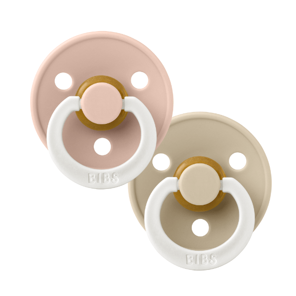 BIBS GLOW Pacifier set in blush and vanilla glow, latex round pacifiers for 0-6 months, soft silicone, gentle for babies.