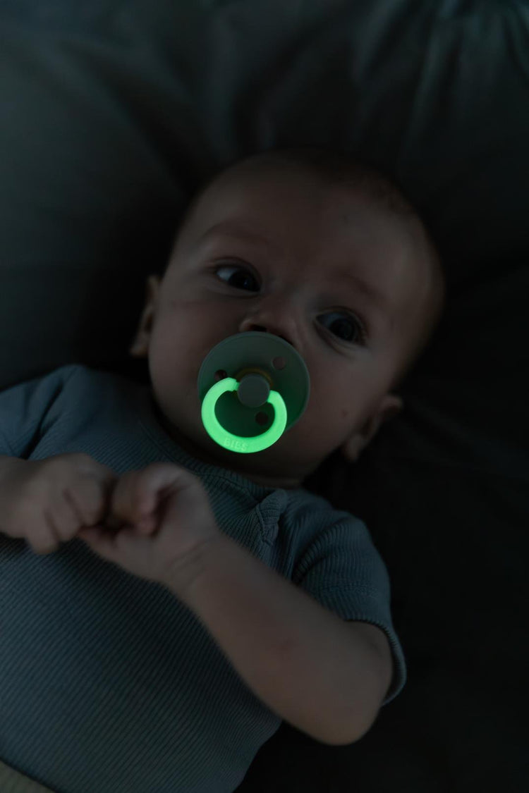 BIBS GLOW Pacifier set with blush and vanilla round latex pacifiers for 0+ months, natural and soothing for babies.