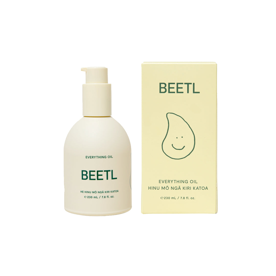 BEETL Everything Oil 230ml bottle showing clear glass container with golden oil inside, labeled with product name and branding.
