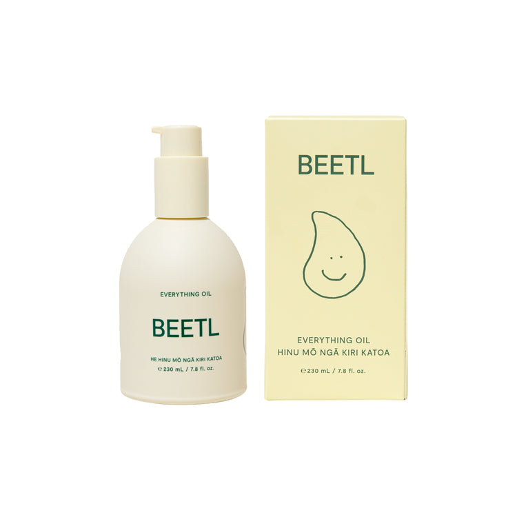 BEETL Everything Oil 230ml bottle showing clear glass container with golden oil inside, labeled with product name and branding.