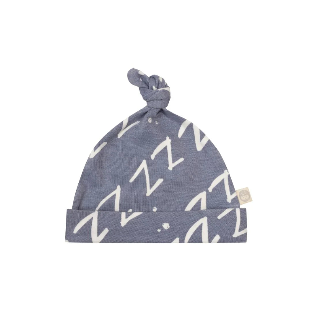 Kippins Bam Organic Knot Beanie for babies, soft cotton knit in natural color, designed for warmth and comfort.