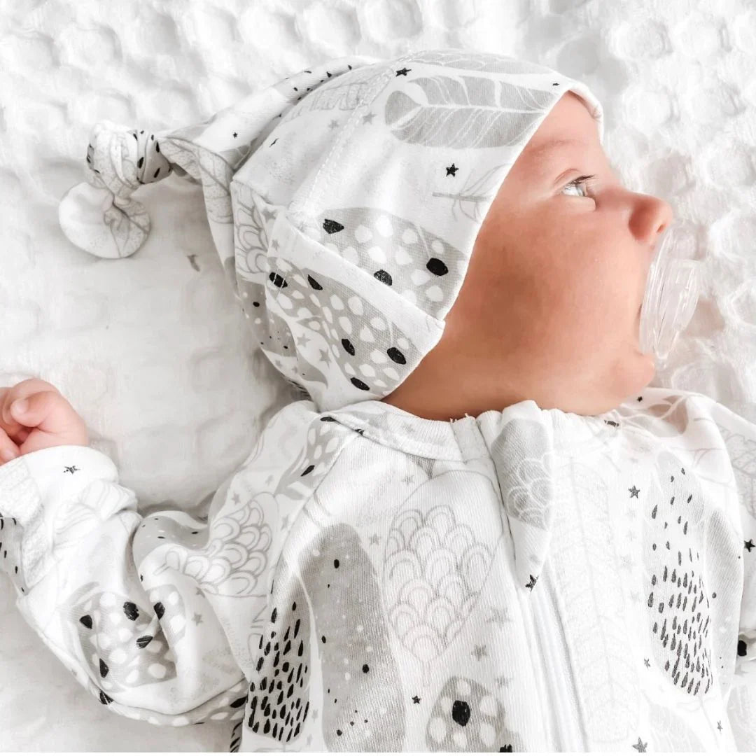 Kippins River Organic Knot Beanie for infants, soft and cozy with a stylish knot design, made from organic materials.