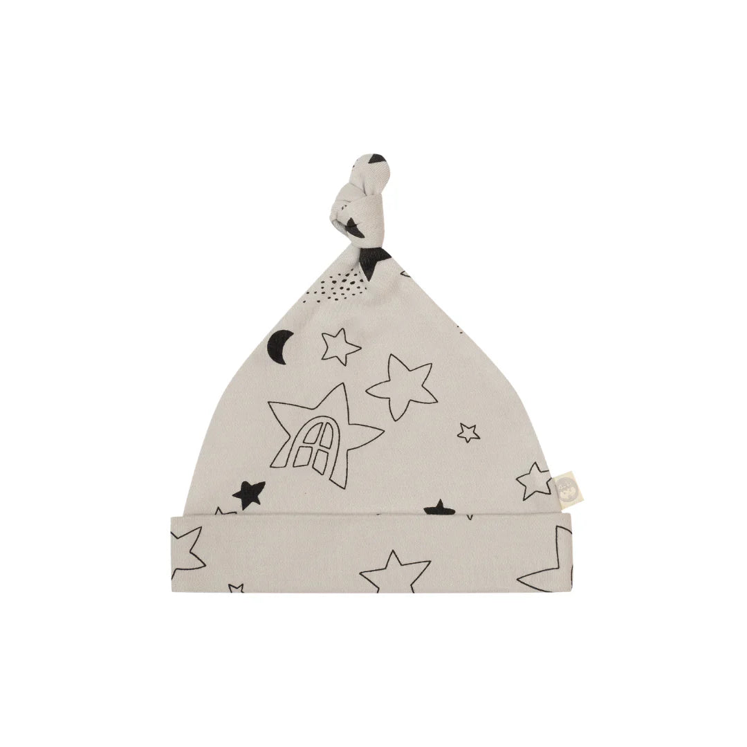 Kippins Star Organic Knot Beanie for infants, soft and cozy cotton knit, featuring a star pattern in natural and blue tones.