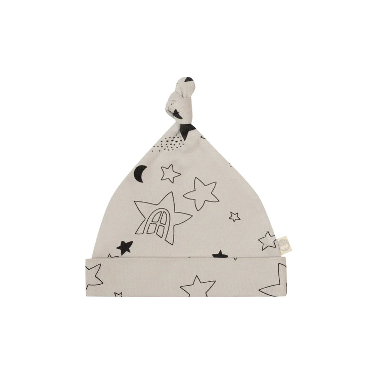 Kippins Star Organic Knot Beanie for infants, soft and cozy cotton knit, featuring a star pattern in natural and blue tones.
