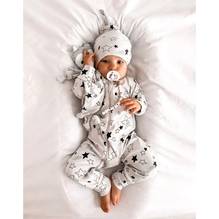 Kippins Star Organic Knot Beanie for infants, soft and cozy, featuring a star pattern and natural organic fabric.