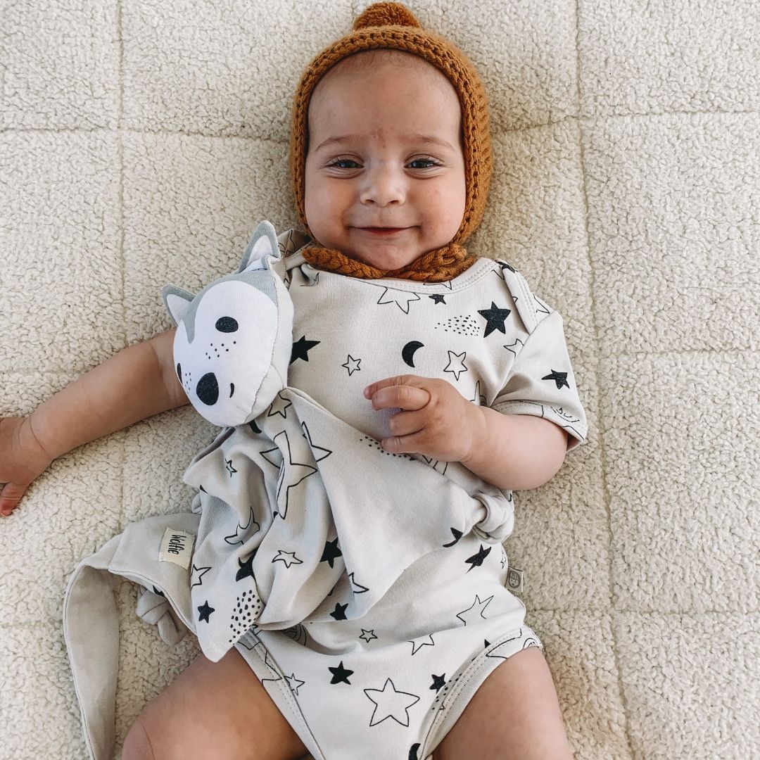 Kippins Star short-sleeve bodysuit for infants, 0-3 months, featuring a cute star design and soft fabric.