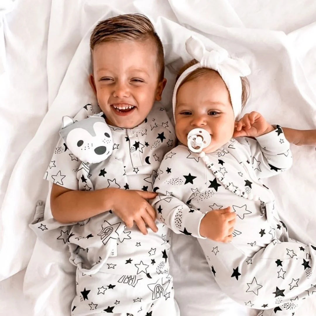 Kippins Star Short Sleeve KipZip Romper for babies, featuring a cute star pattern and easy-to-use zipper closure.